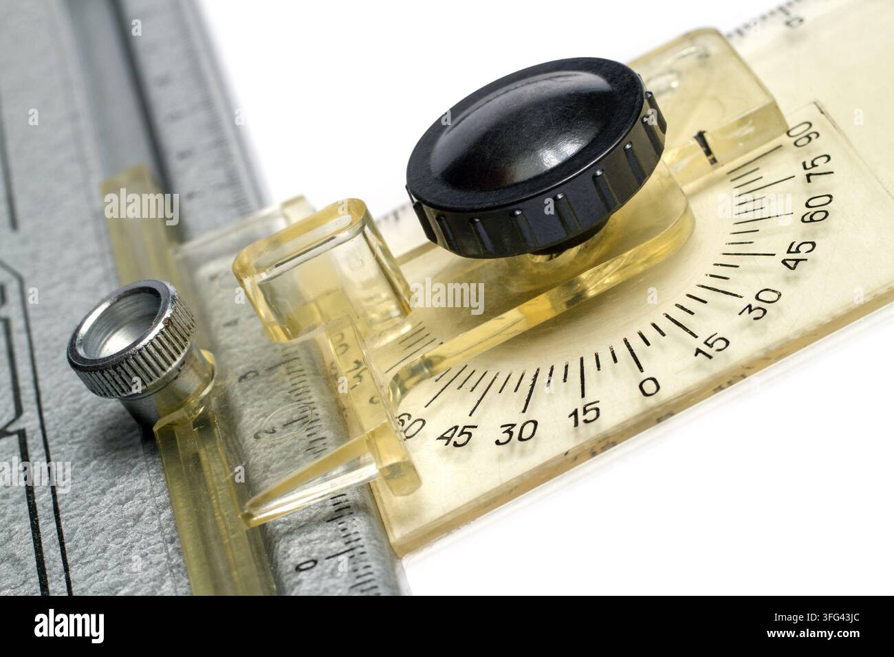 Drafting table with a compass, ruler and technical drawings